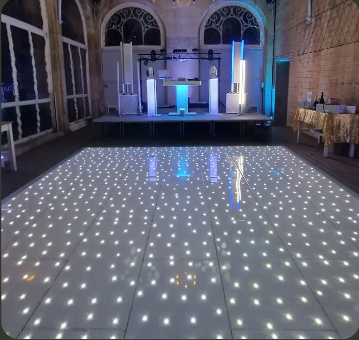 White Starlite LED Dancefloor illuminated at a wedding venue