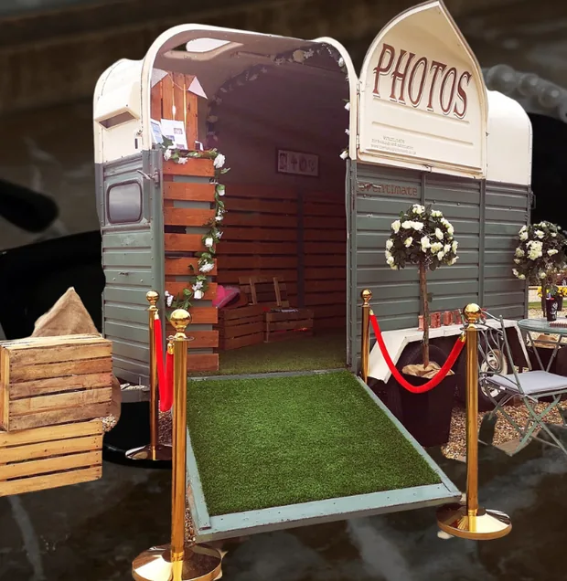 Converted Rustic Horsebox photobooth with a green entrance ramp